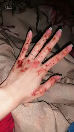 AI TANGAN BERDARAH