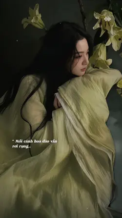 Mỗi cánh hoa đào vẫn