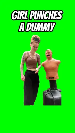 Girl punches a dummy