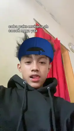 coba pake mukena 