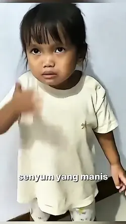 senyum yang manis