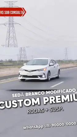 Sedã branco em destaque
