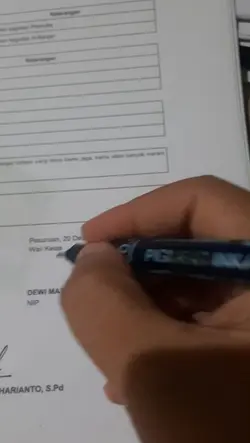 Tanda tangan guru