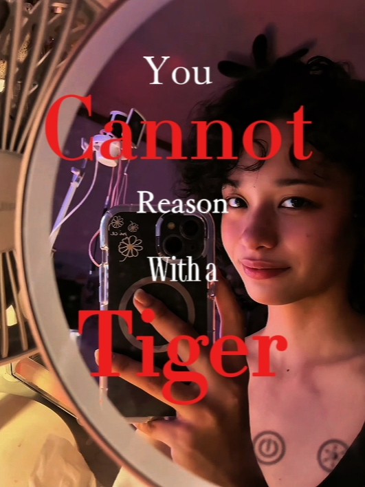 raison avec un tigre