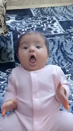 The baby is dancing.