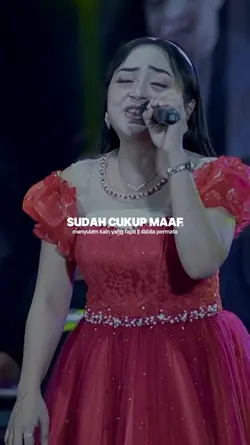 menyulam kain 