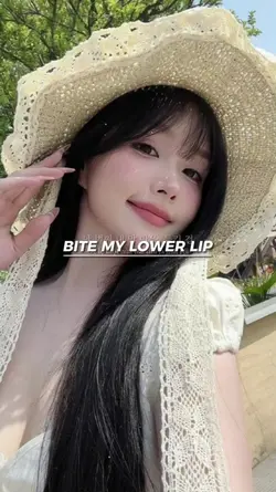 BITE MY LOWER LIP