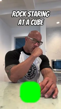 Rock staring at cube