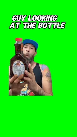 Guy looking at bottl