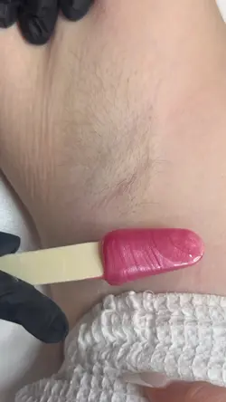 Under arm, wax tutor