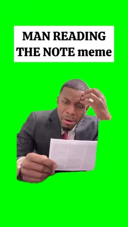 MAN READING THE NOTE