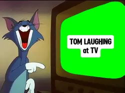 TOM LAUGHING at TV