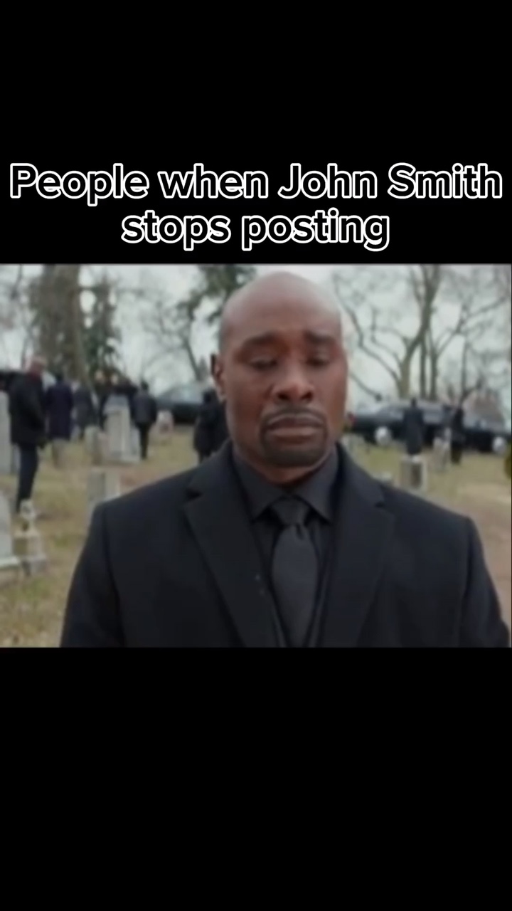Guy crying by grave